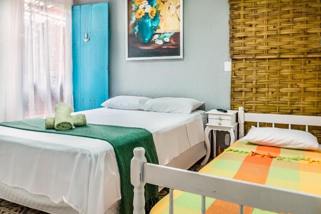 Vilarejo Praia Do Pereque Suites 伊利亚贝拉 外观 照片
