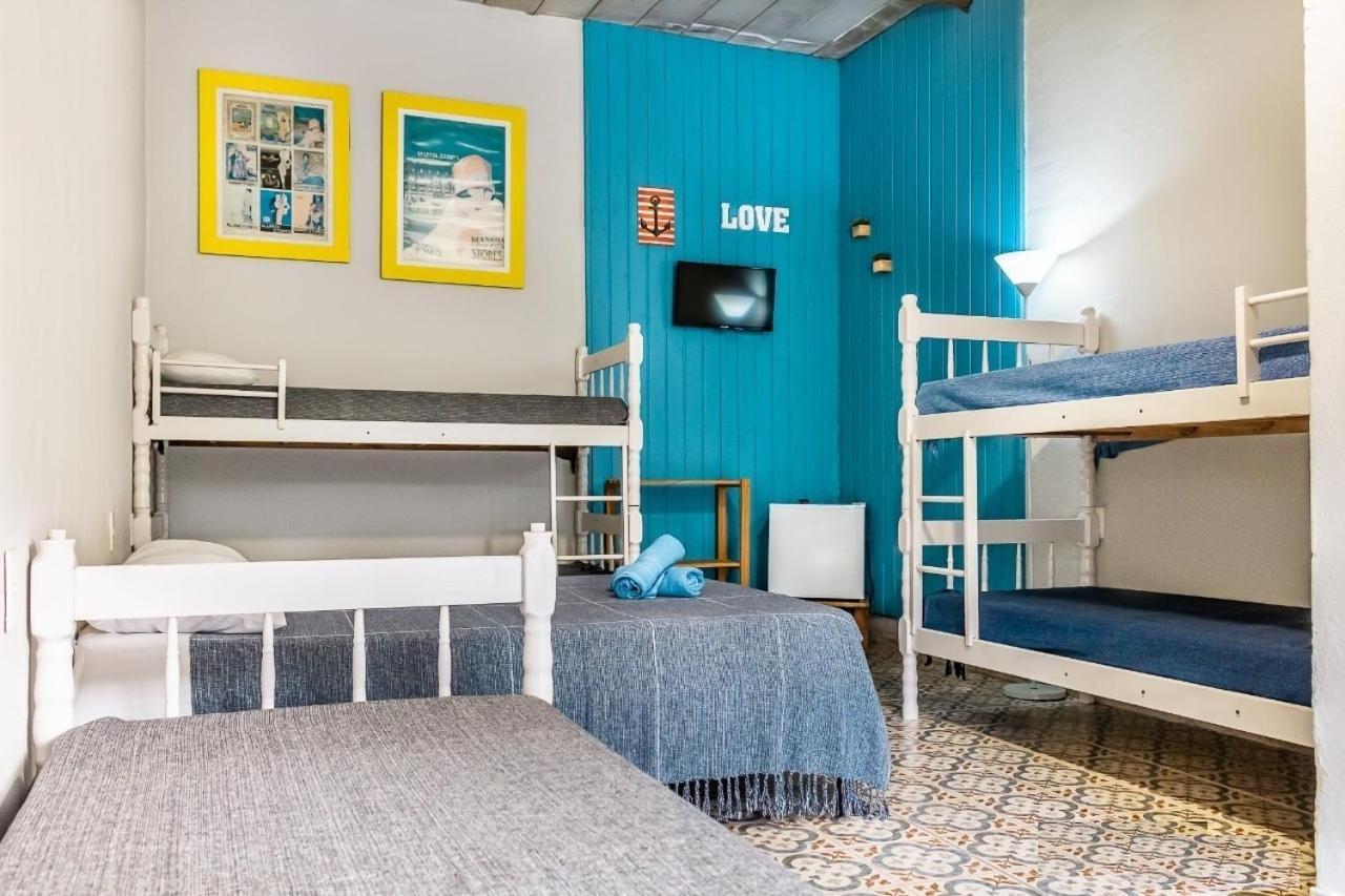 Vilarejo Praia Do Pereque Suites 伊利亚贝拉 外观 照片